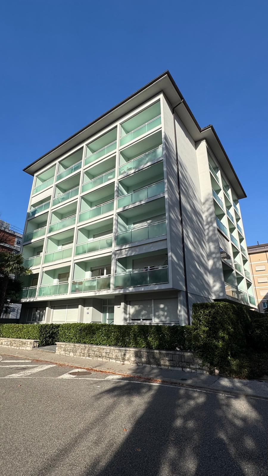 Via del Tiglio 17 — front-right view of the residential building in central Lugano under clear sky